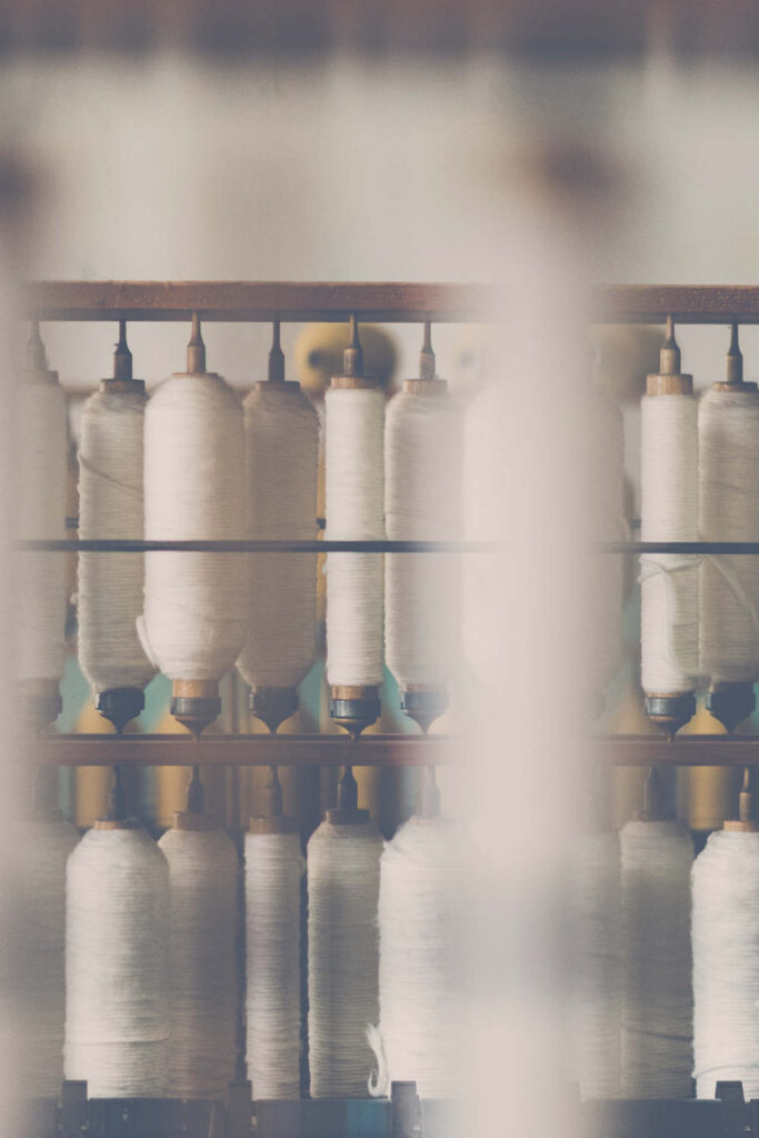 You won’t see “synthetic fabrics” listed on your clothing label, but it’s likely you’re wearing them right now. But how does that look from an environmental standpoint? Image by Janko Ferlič on Unsplash #syntheticfabrics #sustainablejungle