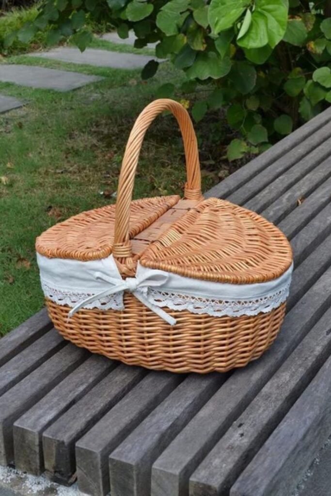 To truly enjoy the great outdoors, we should all do our part to protect them. And that goes for all stages of the picnicking process, from meal planning to packing it all up in an eco friendly picnic basket. Image by Metrovicshop (Etsy Vintage) #ecofriendlypicnicbaskets #sustainablepicnicbaskets #ecofriendlypicnic