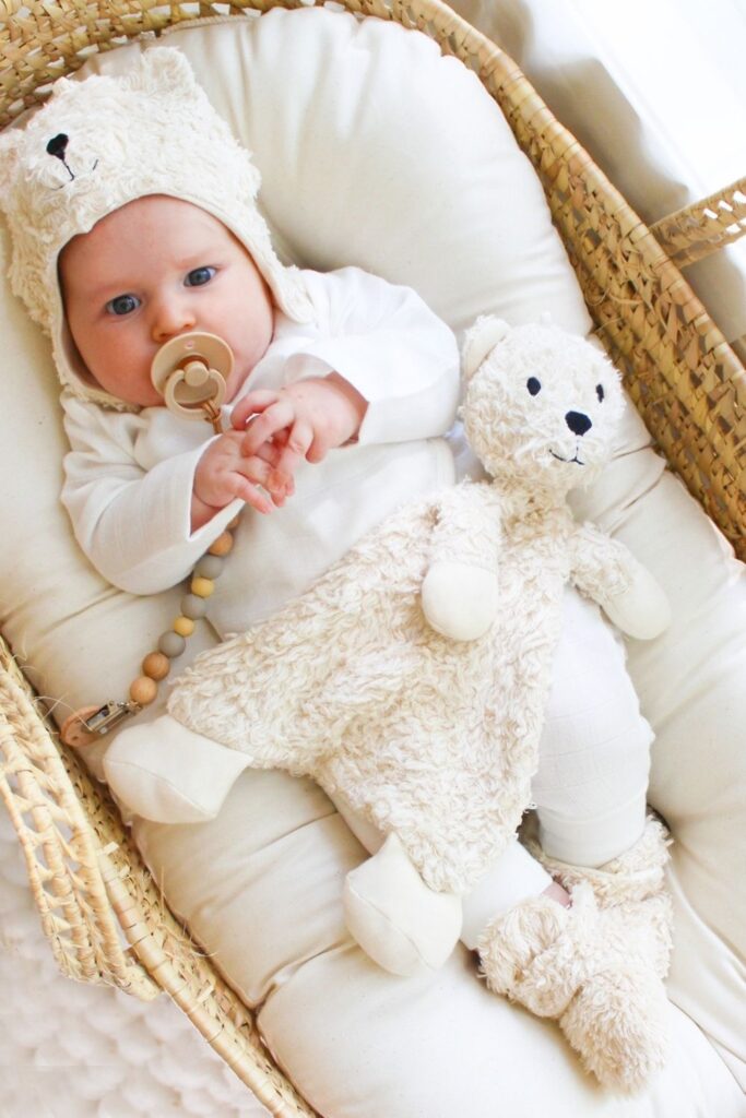 We've explored what it means to raise a zero waste baby, but what about zero fuss babies...you know, a baby playing happily with their new non toxic and organic baby toys. Image by Under The Nile #organicbabytoys #organicbabytoysmadeintheusa #bestorganicbabytoys #nontoxicbabytoys #bestnontoxicbabytoys