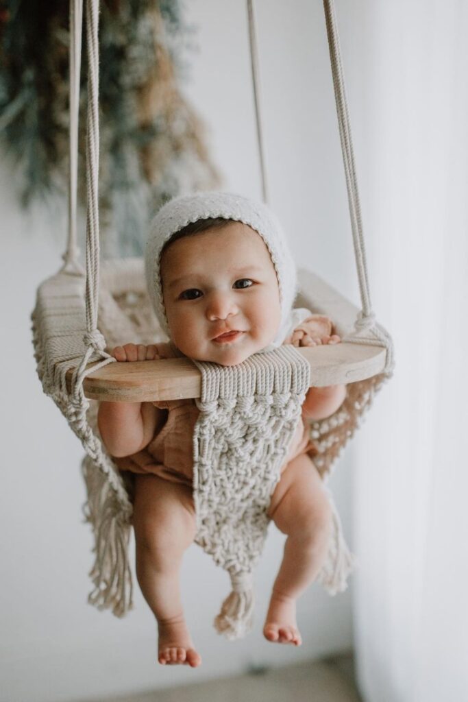 We've explored what it means to raise a zero waste baby, but what about zero fuss babies...you know, a baby playing happily with their new non toxic and organic baby toys. Image by Finn + Emma #organicbabytoys #organicbabytoysmadeintheusa #bestorganicbabytoys #nontoxicbabytoys #bestnontoxicbabytoys