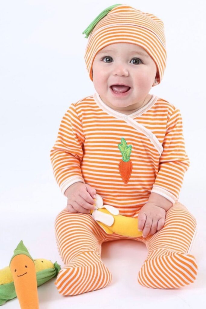 We've explored what it means to raise a zero waste baby, but what about zero fuss babies...you know, a baby playing happily with their new non toxic and organic baby toys. Image by Under the Nile #organicbabytoys #organicbabytoysmadeintheusa #bestorganicbabytoys #nontoxicbabytoys #bestnontoxicbabytoys 