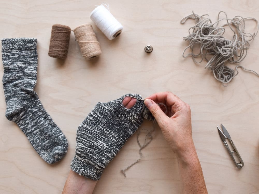 What To Do With Old Socks To Be Toe-tally Sustainable Image by Kislev #whattodowitholdsocks #usesforoldsocks #recyclingoldsocks #howtorecycleoldsocks #reuseoldsocks #whattodowithholeysocks #sustainablejungle