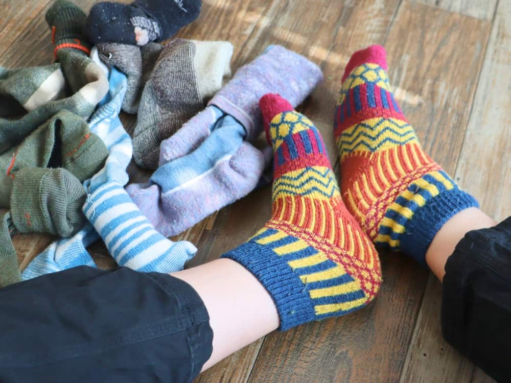 What To Do With Old Socks To Be Toe-tally Sustainable Image by Sustainable Jungle #whattodowitholdsocks #usesforoldsocks #recyclingoldsocks #howtorecycleoldsocks #reuseoldsocks #whattodowithholeysocks #sustainablejungle