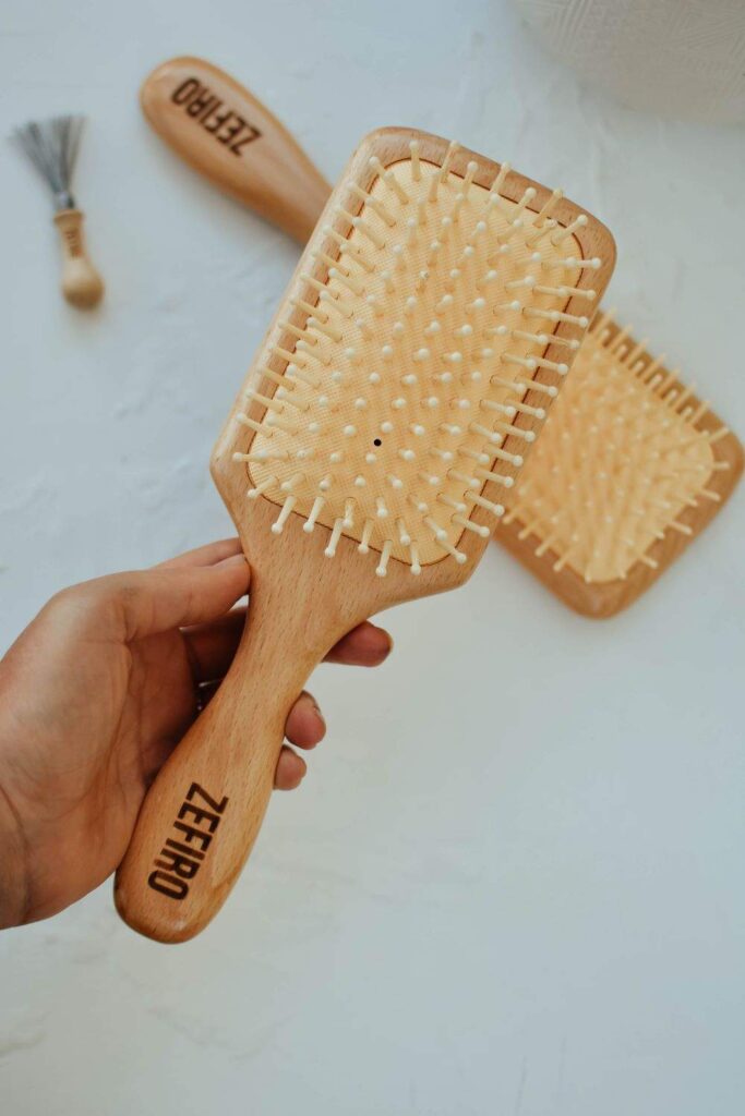 Planet aside, our hair deserves better than plastic hair brushes that damage hair follicles and do a poor job of spreading natural oils. Eco friendly hair brushes to the rescue! Image by Zefiro #ecofriendlyhairbrushes #sustainablehairbrushes #sustainablejungle