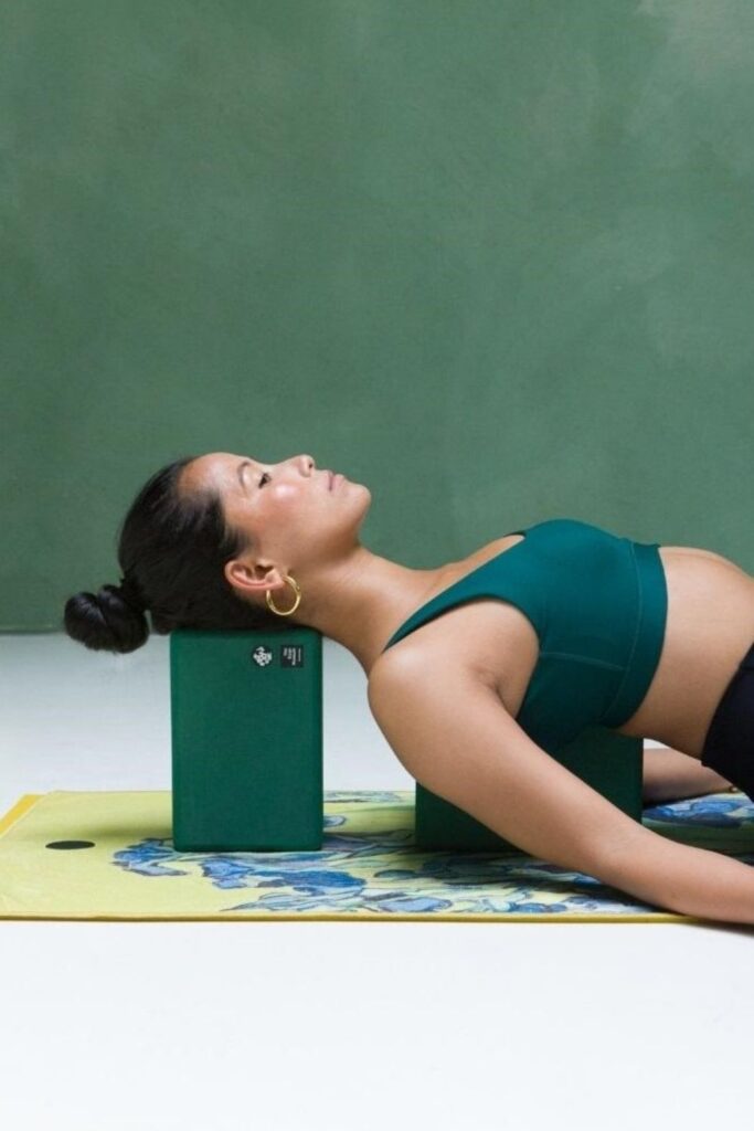 Sustainable yoga props and accessories, like blocks, balls, straps, and bolsters, can help yogis of all levels with flexibility, stability, AND sustainability. Image by Manduka #sustainableyogaprops #sustainableyogaaccessories #sustainablejungle