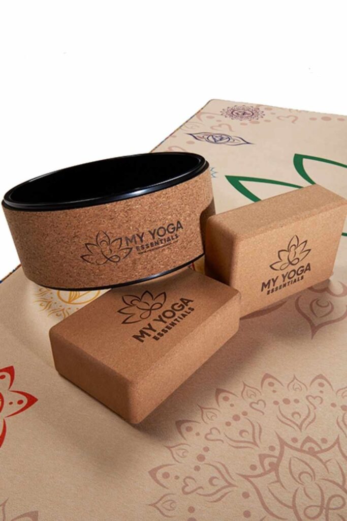 Sustainable yoga props and accessories, like blocks, balls, straps, and bolsters, can help yogis of all levels with flexibility, stability, AND sustainability. Image by My Yoga Essentials #sustainableyogaprops #sustainableyogaaccessories #sustainablejungle