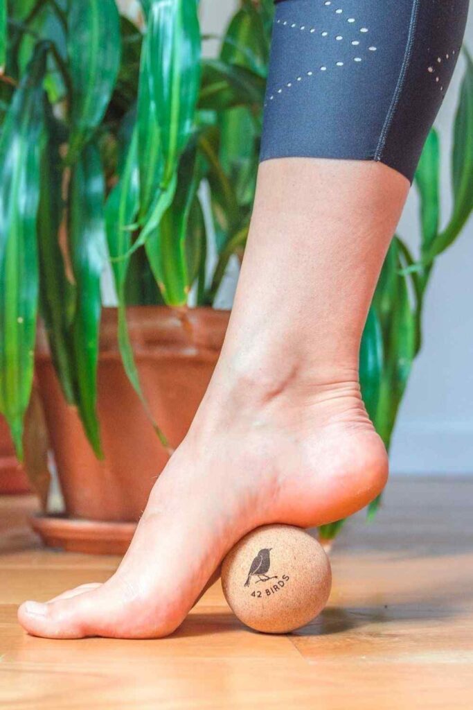 Sustainable yoga props and accessories, like blocks, balls, straps, and bolsters, can help yogis of all levels with flexibility, stability, AND sustainability. Image by 42 Birds #sustainableyogaprops #sustainableyogaaccessories #sustainablejungle