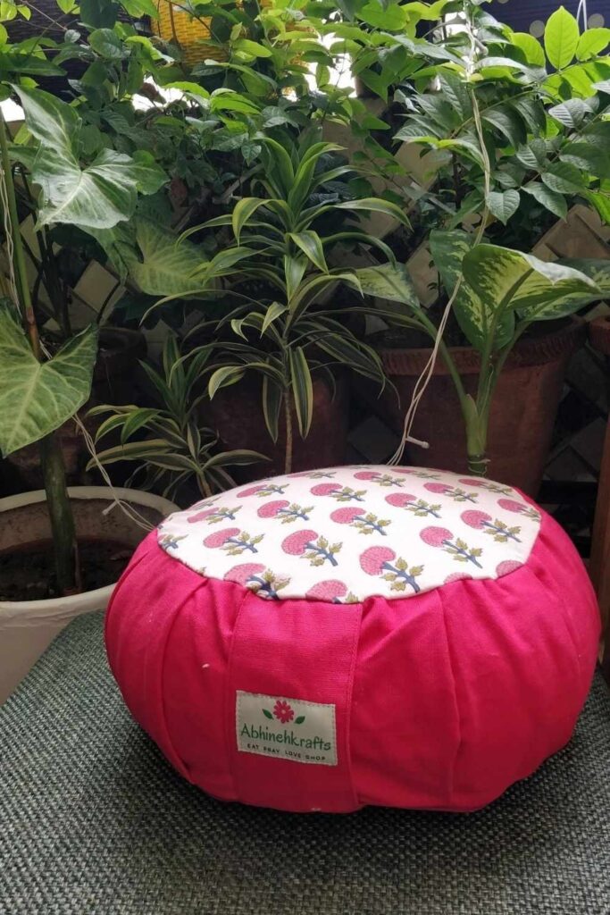 Sustainable yoga props and accessories, like blocks, balls, straps, and bolsters, can help yogis of all levels with flexibility, stability, AND sustainability. Image by Abhine Krafts #sustainableyogaprops #sustainableyogaaccessories #sustainablejungle