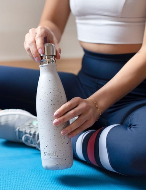 7 Eco-Friendly Water Bottles To Make Each Sip Sustainable Image by S'well #ecofriendlywaterbottles #ecofriendlystainlesssteelwaterbottles #ecofriendlyreusablewaterbottles #sustainablewaterbottles #sustainableglasswaterbottles #ecofriendlybottles #sustainablejungle