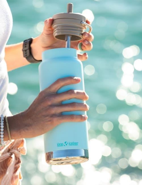7 Eco-Friendly Water Bottles To Make Each Sip Sustainable Image by Klean Kanteen #ecofriendlywaterbottles #ecofriendlystainlesssteelwaterbottles #ecofriendlyreusablewaterbottles #sustainablewaterbottles #sustainableglasswaterbottles #ecofriendlybottles #sustainablejungle