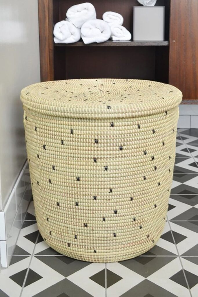 If you’re close to throwing in the towel, our list of sustainable laundry baskets might help take a [laundry] load off your mind. Image by Swahili Modern #sustainablelaundrybasket #ecofriendlylaundrybaskets #sustainablejungle