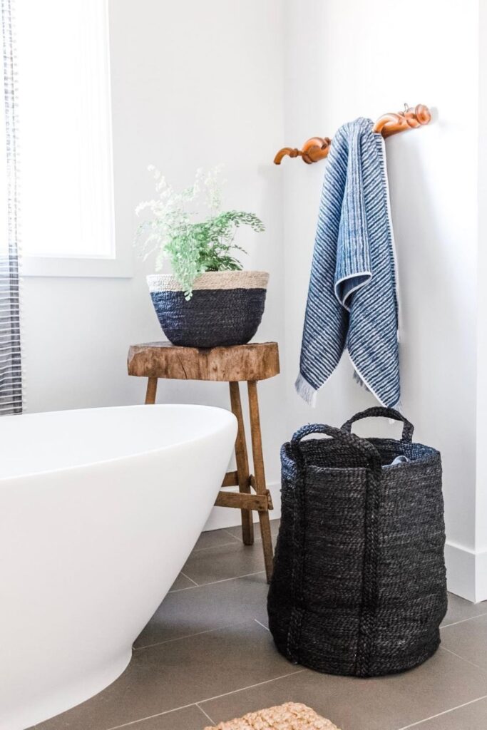 If you’re close to throwing in the towel, our list of sustainable laundry baskets might help take a [laundry] load off your mind. Image by Will & Atlas #sustainablelaundrybasket #ecofriendlylaundrybaskets #sustainablejungle