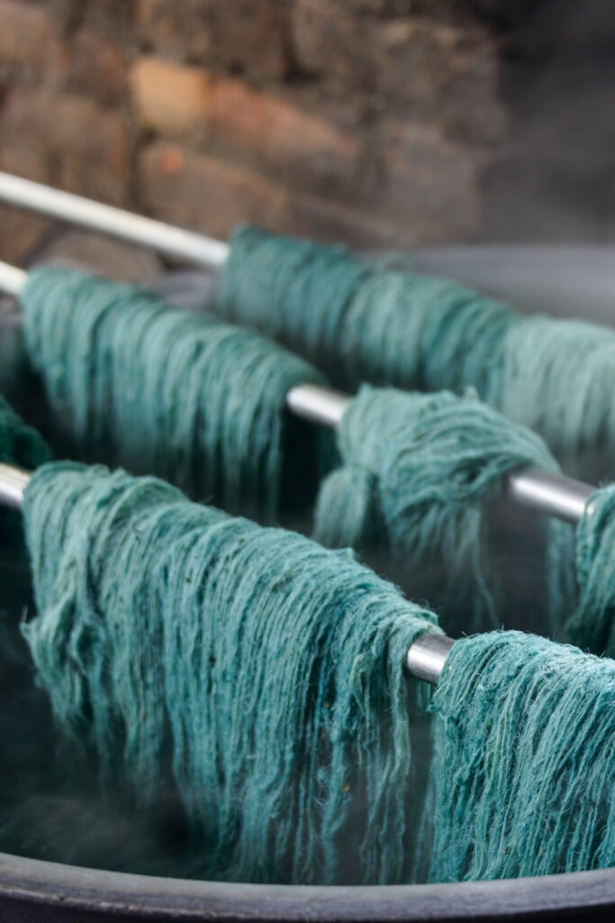 Sustainable Dyes: Is Conscious Color Possible? #sustainabledyes #sustainablefabircdyes #sustainabletetextiledyes #arenaturaldyessustainablle #ecofriendlydyes #lowimpactdyes #sustainablejungle Image by Thomas Dutour via Canva Pro