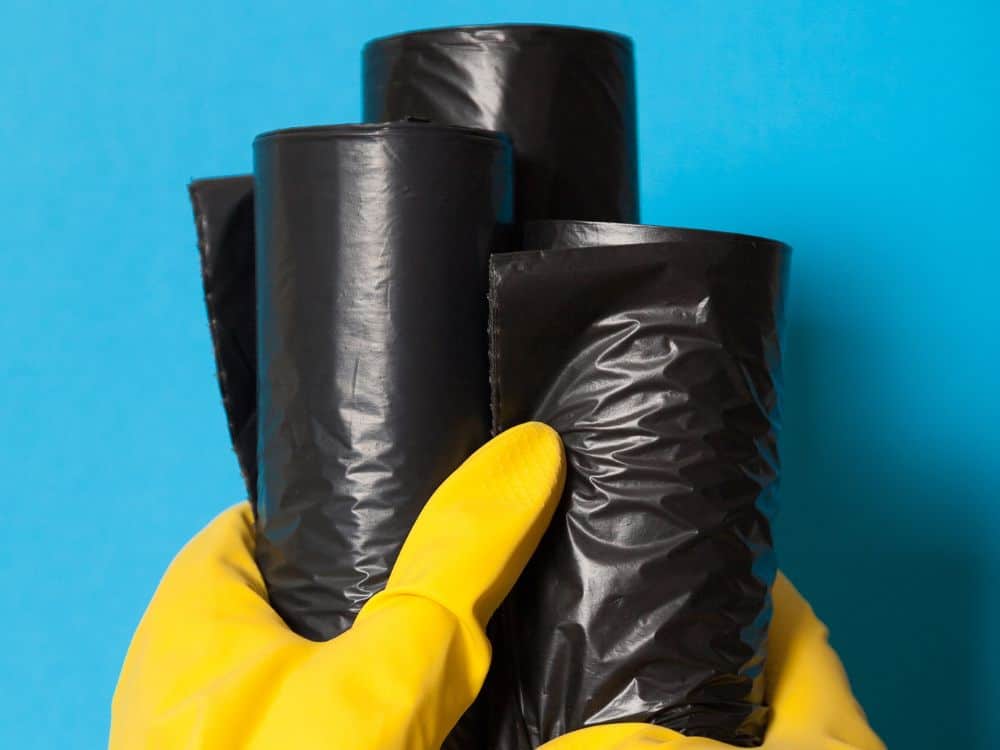 Let’s Talk Trash: Are Trash Bags Recyclable? Image by Andrii Zastrozhnov via Getty Images on Canva Pro #aretrashbagsrecyclable #aregarbagebagsrecyclable #canyourecycleplastictrashbags #areplasticgarbagebagsrecyclable #sustainablejungle
