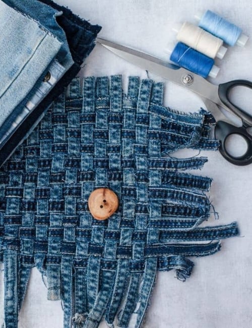 What To Do With Old Jeans: 7 Denim Recycling Ideas To Make Old Blue Jeans Green Image by Elena Belykh via Getty Images on Canva Pro #whattodowitholdjeans #upcyclewhattodowitholdjeans #whattodowitholddenimjeans #denimrecycling #denimrecyclingprograms #denimrecyclingprojects #sustainablejungle