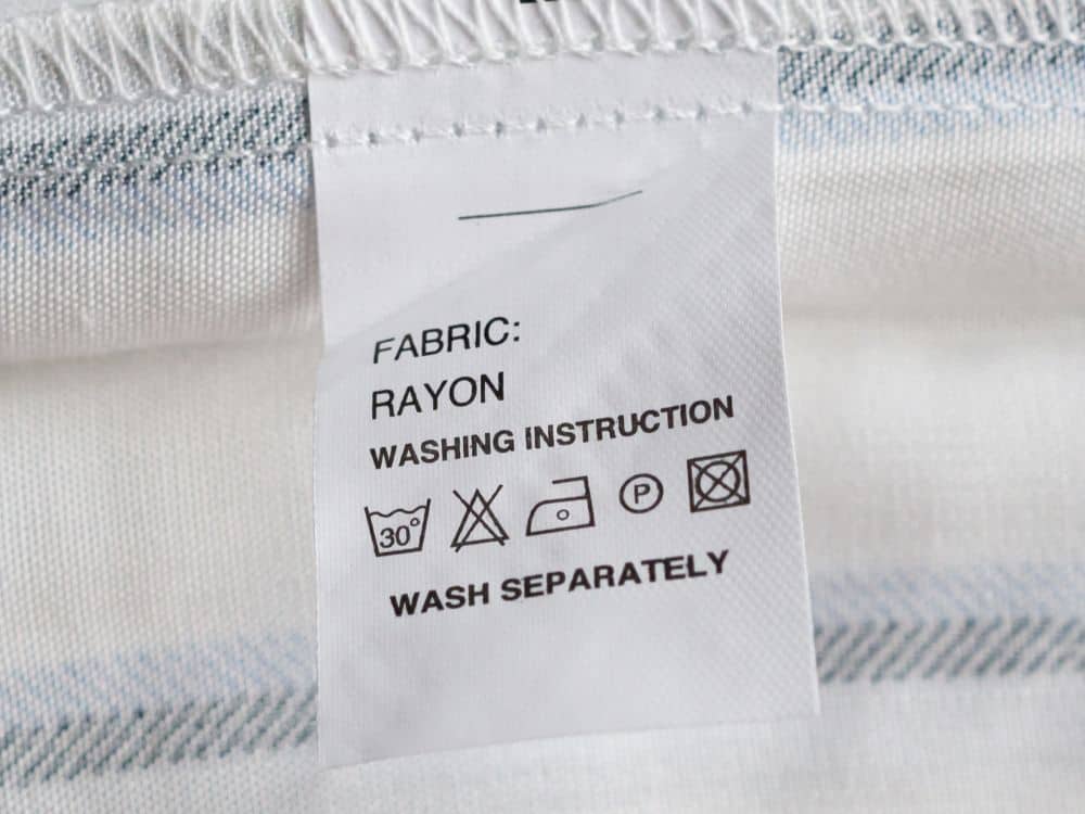 What is Rayon Fabric 2023 Image by Kwangmoozaa via Getty Images on Canva Pro #rayonfabric #whatisrayonfabric #israyonsustainable #howsustainableisrayon #lyocellrayonfabric #prosandconsofrayonfabric #sustainablejungle