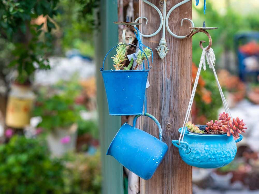 From Waste to Wow: 19 Creative Garden Recycling Ideas to Revitalize Your Garden Image by corelens #gardenrecyclingideas #upcyledgardenideas #creativegardenrecyclingideas #gardenupcycleideas #diyupcycledgardenideas #recyclinginthegardenideas #sustainablejungle