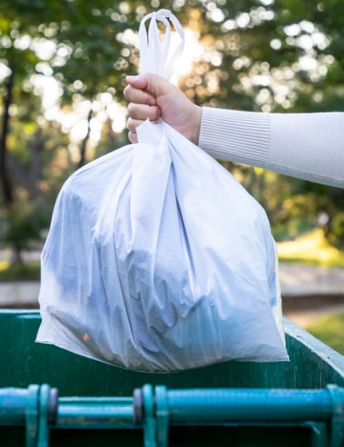 Free Photo  Close up of trash bags filled with trash after cleaning the  environment