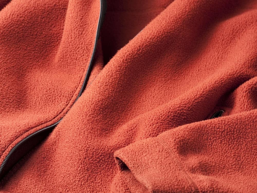 What Is Fleece Fabric & How Sustainable Is It? Image by gyro #whatisfleece #fleecefabric #whatisfleecemadeof #definefleece #disadvantagesoffleece #whatmaterialisfleece #sustainablejungle