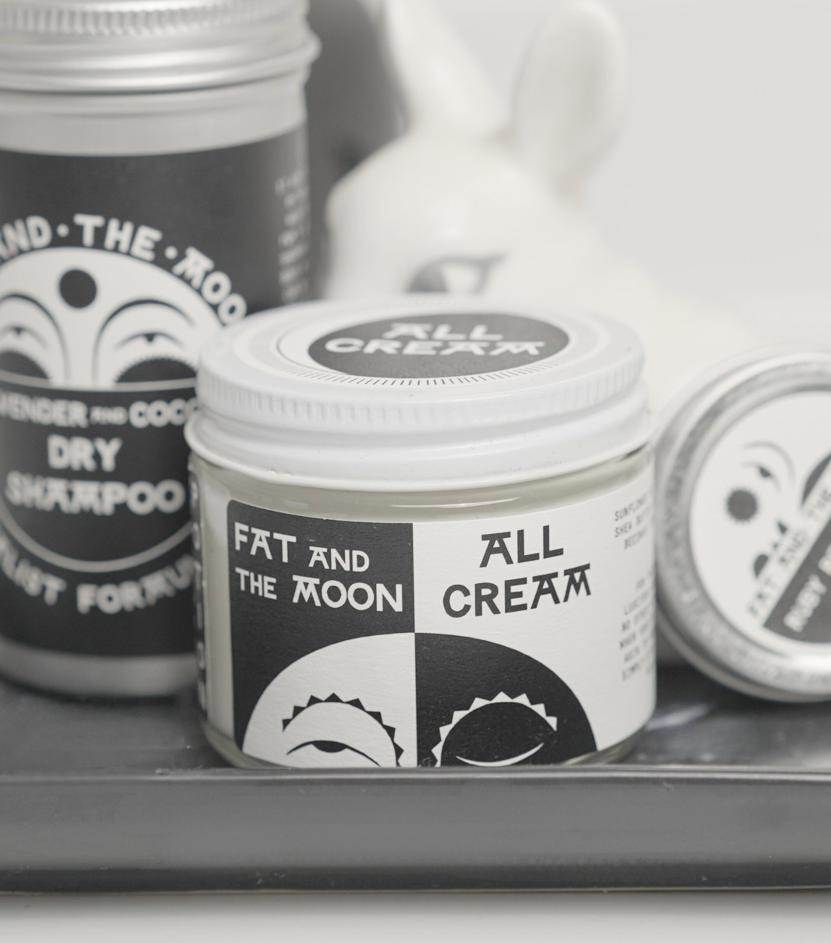 Sustainable Jungle's testing of Fat and the Moon All Cream moisturizer in a reusable glass jar alongside their Dry Shampoo and other zero waste skincare products
