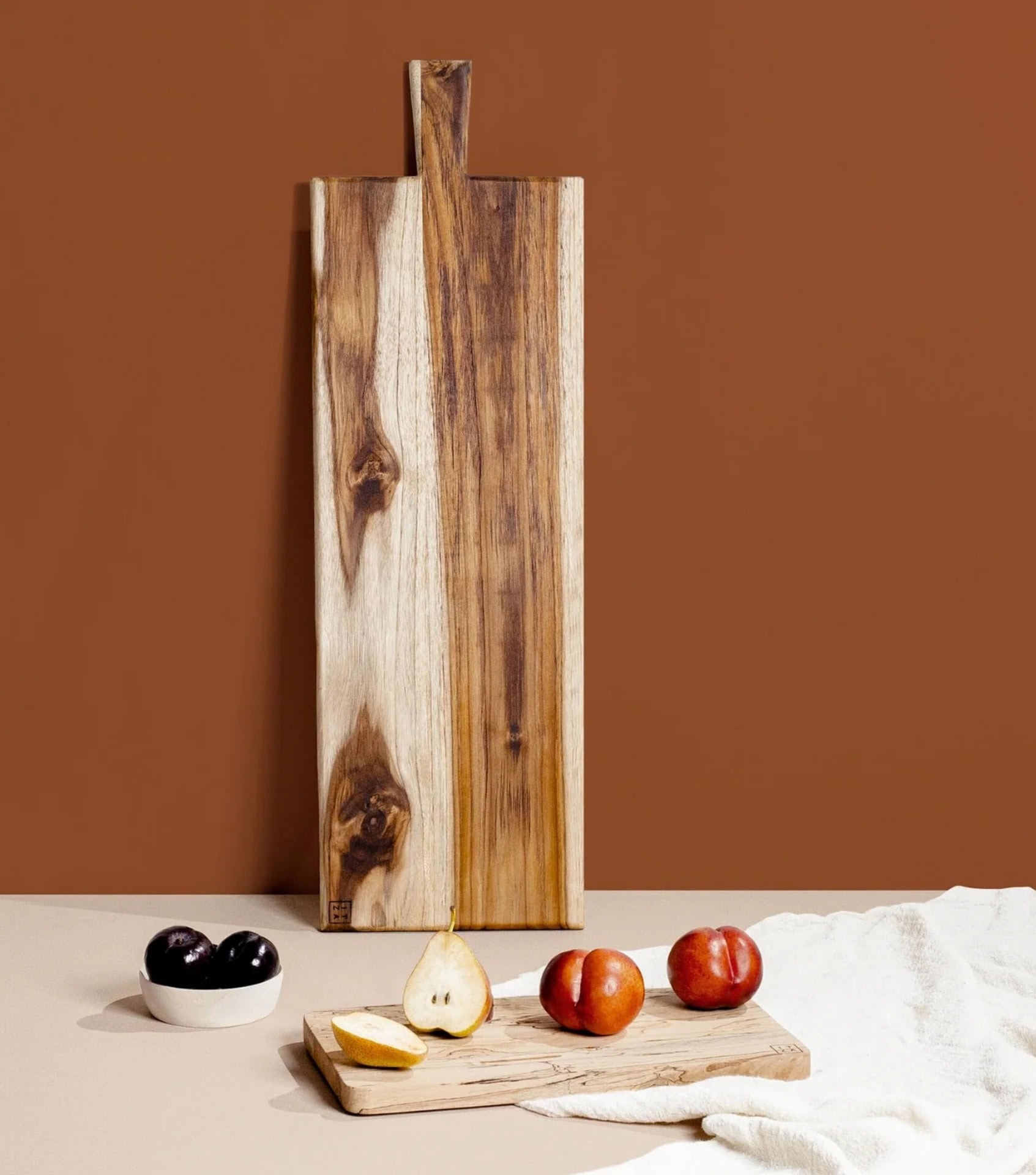 Itza Wood live-edge acacia cutting board made from single piece of sustainably sourced wood
